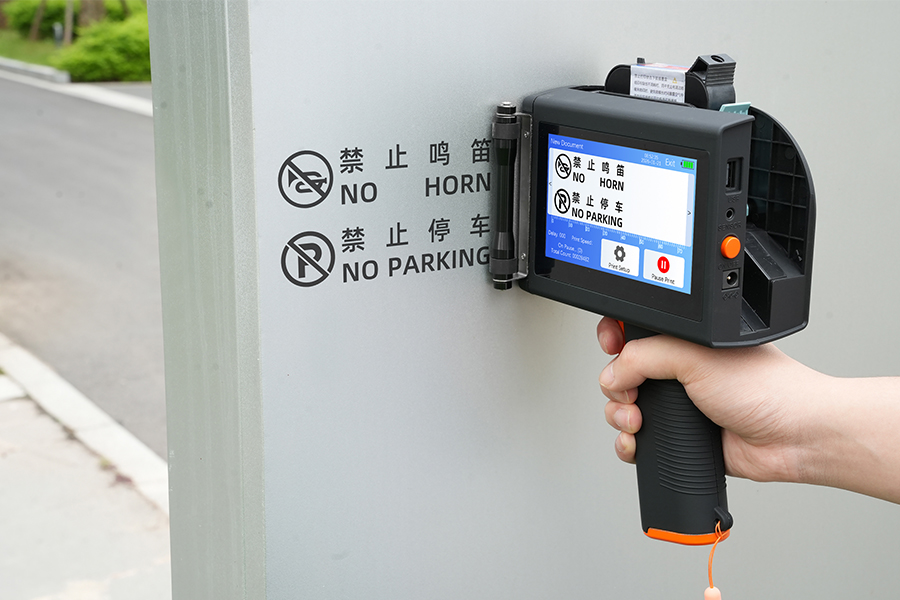 Handheld inkjet printer