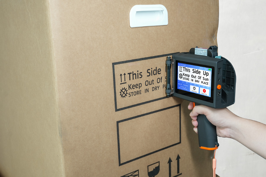 Handheld inkjet printer